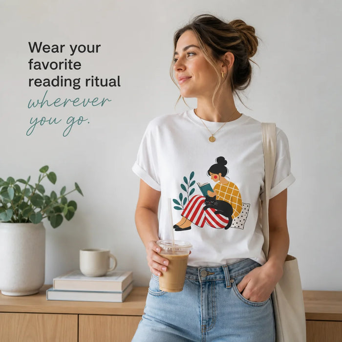 Cozy Reader with Cat T-Shirt Wear your favorite reading ritual wherever you go